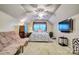 Comfortable bedroom with a futon, bed, and television at 394 Runnymede Dr, Rock Hill, SC 29732