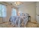 Comfortable bedroom featuring carpet floors, natural light, and neutral-toned walls at 394 Runnymede Dr, Rock Hill, SC 29732