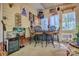 A sunroom with a bar and entertainment area perfect for hosting gatherings, featuring a wine rack at 394 Runnymede Dr, Rock Hill, SC 29732