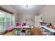 Large bonus room offers flexible space for recreation and storage, with wood flooring at 4721 Myers Ln, Harrisburg, NC 28075