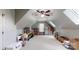 Spacious bonus room with neutral carpet and unique architecture ready to be customized to your lifestyle at 4721 Myers Ln, Harrisburg, NC 28075