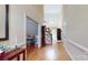 Spacious foyer with hardwood floors, high ceilings, a staircase, and natural light at 4721 Myers Ln, Harrisburg, NC 28075