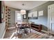 Cozy dining room with modern lighting, stylish decor, and seating for four at 501 8Th Sw Ave, Conover, NC 28613