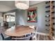 Charming dining room features a wooden table, stylish wine rack, and modern light fixture at 501 8Th Sw Ave, Conover, NC 28613