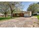 Traditional brick home featuring an attached garage and a spacious driveway at 501 8Th Sw Ave, Conover, NC 28613