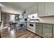 Open kitchen with a breakfast bar, a vintage-style oven, and an adjacent dining area at 501 8Th Sw Ave, Conover, NC 28613