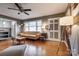 Sunlit living room with hardwood floors and stylish decor, connecting to the kitchen for seamless living at 501 8Th Sw Ave, Conover, NC 28613