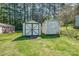 A pair of sheds provides ample storage space in the backyard at 501 8Th Sw Ave, Conover, NC 28613