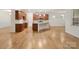 Spacious open kitchen featuring hardwood floors, a central island, and ample cabinet space at 527 Livingston Dr, Lancaster, SC 29720