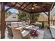 Well-appointed gazebo with stylish furniture, perfect for relaxation and entertaining at 5629 Berry Ridge Dr, Harrisburg, NC 28075