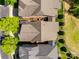 Aerial view showing the roof and backyard of the home and surrounding properties at 6024 Glenmore Garden Dr, Charlotte, NC 28270