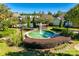 Picturesque community with a beautiful fountain, manicured landscaping, and inviting benches at 6024 Glenmore Garden Dr, Charlotte, NC 28270