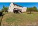 View of the backyard featuring a deck, fenced yard and lush green lawn at 6061 Piscataway Ct, Rock Hill, SC 29732