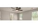 Bedroom with neutral carpeting, neutral colored walls, blinds, and a ceiling fan at 6061 Piscataway Ct, Rock Hill, SC 29732