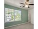 Comfortable bedroom with a ceiling fan and a window overlooking the neighborhood at 6061 Piscataway Ct, Rock Hill, SC 29732