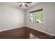 Comfortable bedroom with hardwood floors and a window offering views of the outdoors at 6061 Piscataway Ct, Rock Hill, SC 29732