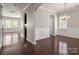 Bright and airy living space with hardwood floors, decorative trim, and an open floor plan at 6061 Piscataway Ct, Rock Hill, SC 29732