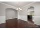 Spacious open-concept living area with hardwood floors and access to the adjacent kitchen at 6061 Piscataway Ct, Rock Hill, SC 29732