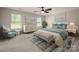 Inviting main bedroom boasting bright windows, stylish décor, and comfortable seating at 6061 Piscataway Ct, Rock Hill, SC 29732
