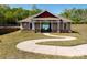 Community pool house, enhanced with attractive architecture, next to a paved walkway at 6061 Piscataway Ct, Rock Hill, SC 29732