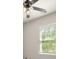 Window view featuring green, tree-filled scenery and a ceiling fan at 6061 Piscataway Ct, Rock Hill, SC 29732