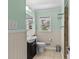 Cozy bathroom with beadboard walls, stylish vanity, and classic fixtures at 6127 Rosecrest Dr, Charlotte, NC 28210