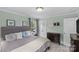 Bedroom featuring a comfortable bed, soothing colors and ample storage space at 6127 Rosecrest Dr, Charlotte, NC 28210