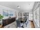 Formal dining room with elegant furnishings, including a large wooden table, upholstered chairs, and decorative accents at 6127 Rosecrest Dr, Charlotte, NC 28210