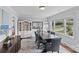 Tastefully decorated dining area with ample natural light, showcases a blend of modern and traditional design elements at 6127 Rosecrest Dr, Charlotte, NC 28210