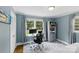 Office space offers natural light, hardwood floors and built in storage at 6127 Rosecrest Dr, Charlotte, NC 28210