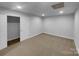 Bright bedroom with neutral carpet, fresh paint, and a closet for ample storage at 6204 River Birch Dr, Gastonia, NC 28056