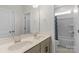 Bright bathroom with double sinks, and a separate shower/tub combo with a toilet at 8008 Hudson Mill Dr, Waxhaw, NC 28173