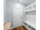 Mudroom boasts a built-in bench with cubbies, storage, and convenient access to the entrance at 8008 Hudson Mill Dr, Waxhaw, NC 28173