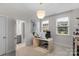 Inviting home office featuring natural light and a view into an attached bathroom at 8008 Hudson Mill Dr, Waxhaw, NC 28173