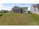 Spacious backyard with well-maintained lawn, offering ample space for outdoor activities and relaxation at 804 Birdsong Way, Fort Mill, SC 29715