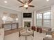 The living room showcases a cozy fireplace, stylish furnishings, and natural light at 804 Birdsong Way, Fort Mill, SC 29715