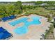 Stunning aerial view of a uniquely shaped pool and lounge area at 804 Birdsong Way, Fort Mill, SC 29715