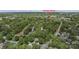 Aerial view showcases the property's location with lush greenery and proximity to Birkdale Village at 8517 Sandowne Ln, Huntersville, NC 28078