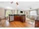 Bright, updated kitchen with granite countertops, stainless steel appliances and hardwood flooring at 8517 Sandowne Ln, Huntersville, NC 28078