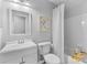 Bathroom with a shower/tub combo, vanity, and framed wall art at 879 Knightsbridge Rd, Fort Mill, SC 29708