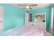 Bright bedroom with blue walls, white furniture, and a ceiling fan at 879 Knightsbridge Rd, Fort Mill, SC 29708