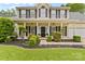 Inviting front porch with classic columns and manicured landscaping at 879 Knightsbridge Rd, Fort Mill, SC 29708