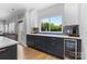 Bright kitchen with stainless steel appliances, wine cooler and backyard view at 879 Knightsbridge Rd, Fort Mill, SC 29708