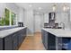 Stylish kitchen with an island, modern appliances, and plenty of cabinet space at 879 Knightsbridge Rd, Fort Mill, SC 29708