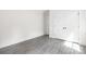 Modern bedroom features a double door closet, with minimal decor and bright, natural light at 8937 Penstemons Dr, Charlotte, NC 28215