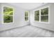 Bedroom featuring bright natural light, neutral walls, and carpeted floors at 8937 Penstemons Dr, Charlotte, NC 28215