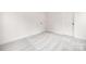 Clean, minimalist bedroom featuring neutral walls, carpet flooring, and two doors at 8937 Penstemons Dr, Charlotte, NC 28215