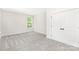 Clean bedroom with one window, carpet floor, closet, and neutral walls at 8937 Penstemons Dr, Charlotte, NC 28215