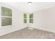 Inviting bedroom with wood-style flooring, natural light, and modern finishes creating a calming atmosphere at 8937 Penstemons Dr, Charlotte, NC 28215