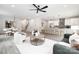 Open-concept living space with dining area, modern kitchen, and cozy seating area at 8937 Penstemons Dr, Charlotte, NC 28215